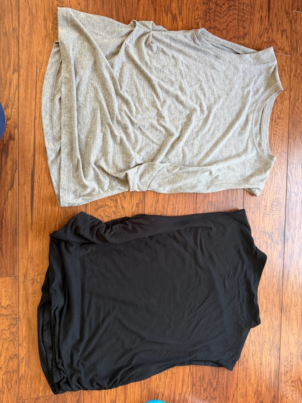 A new day Soft Heather Gray tank and a solid black- both cinched